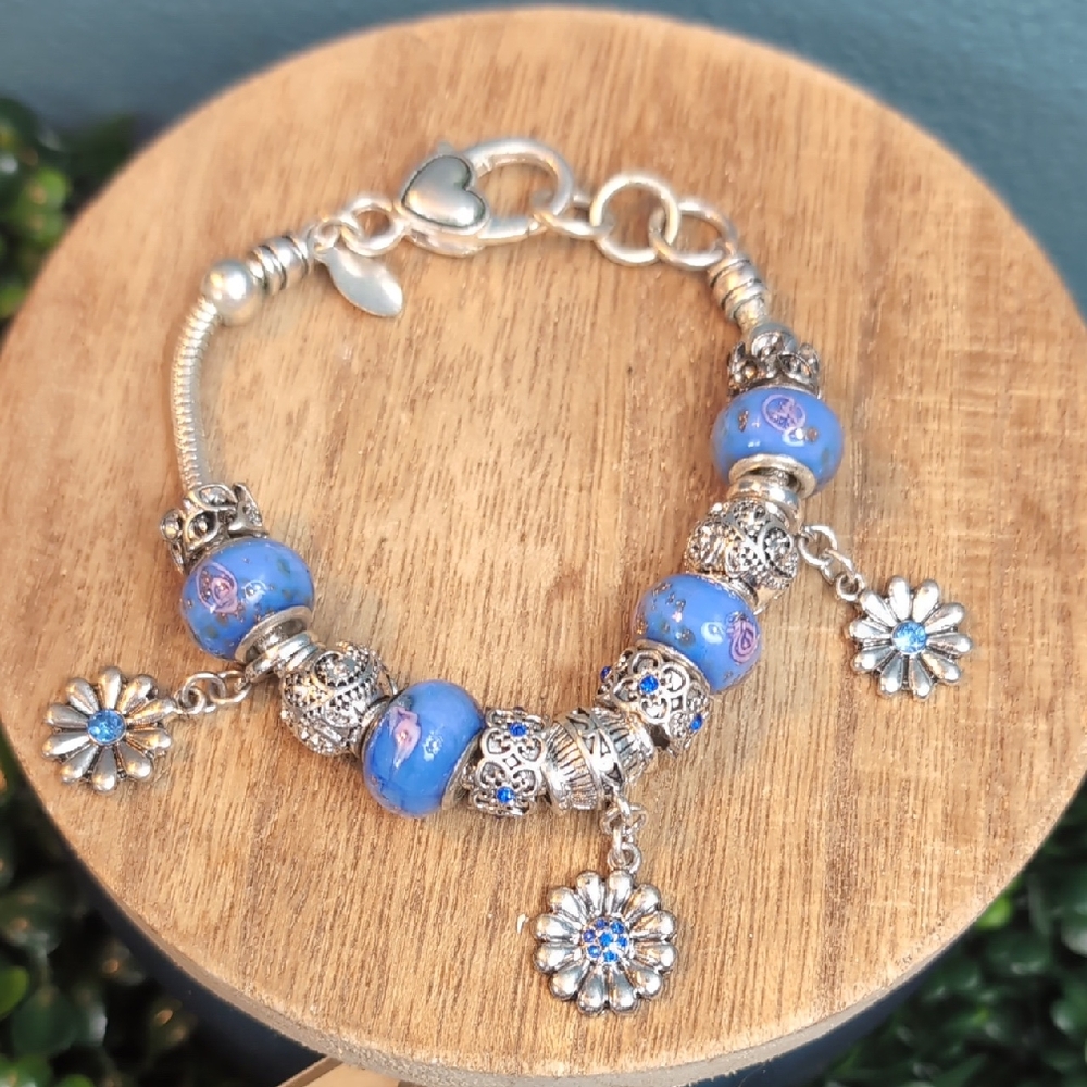 Charming Blue and Silver Bracelet with Floral Accents